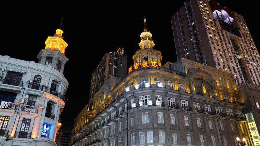 Modern and old buildings on Jianghan pedestrian street, Wuhan.