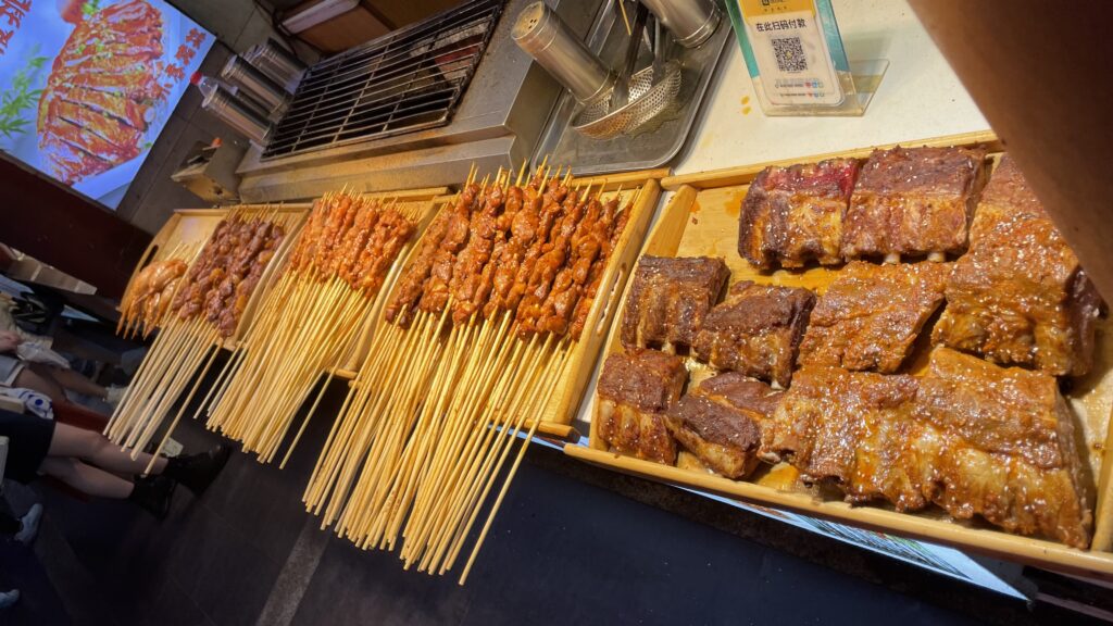 A tray of assorted skewers at a street food stall in Wuhan.